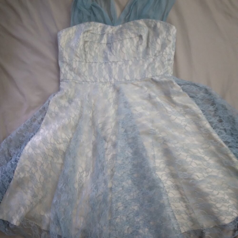 retro-esq blue lace over cream fabric dress from London based company